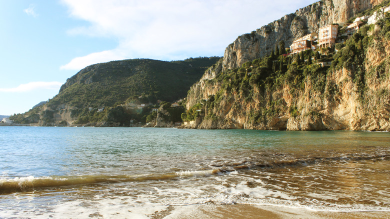 Mountainous beach from shore