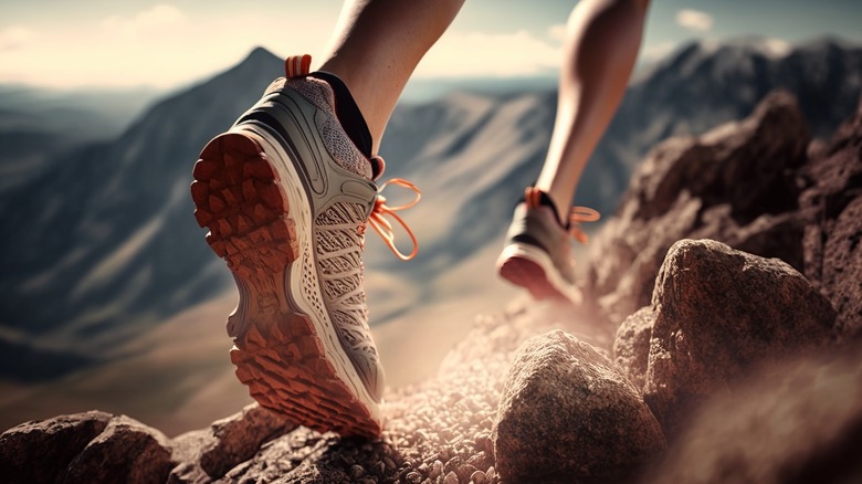 Hiker feet on hill