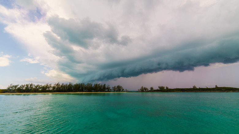 Dark cloud over water