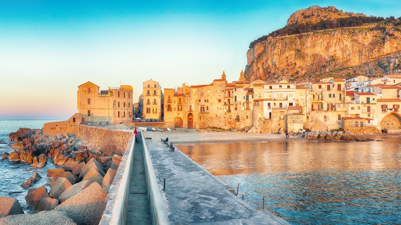 Waterside path to buildings Palermo, Italy