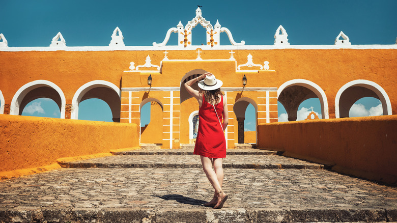 woman in red in Izamal