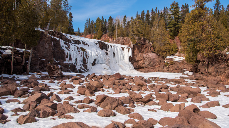 Frozen, snow-covered waterfall