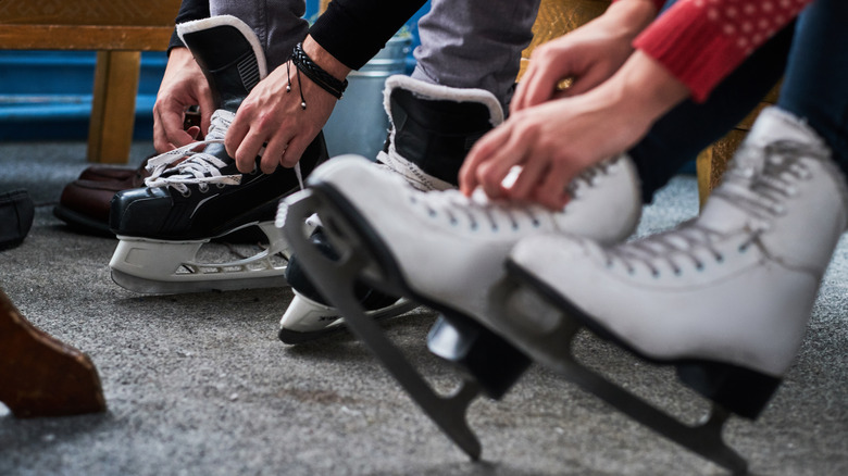 Putting on ice skates