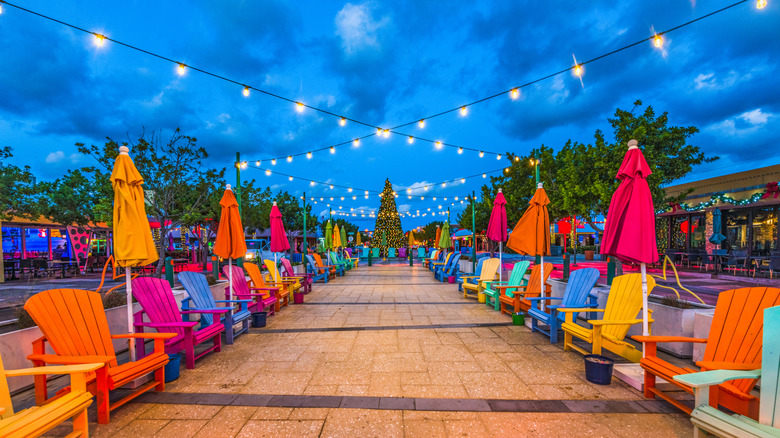 Colorful chairs along pedestrian street