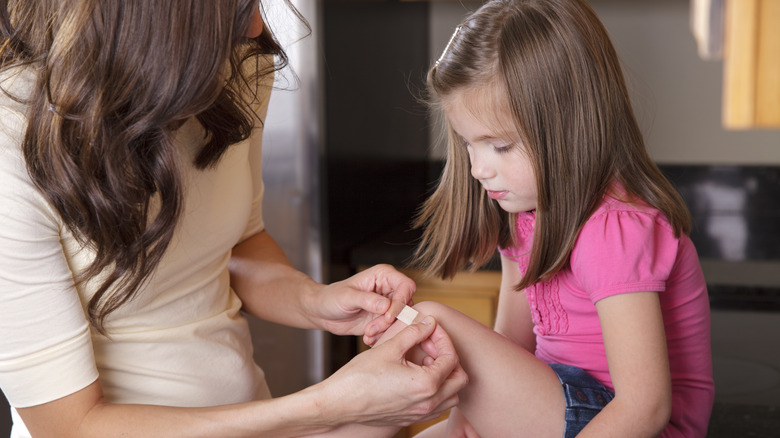 Kid getting bandaid