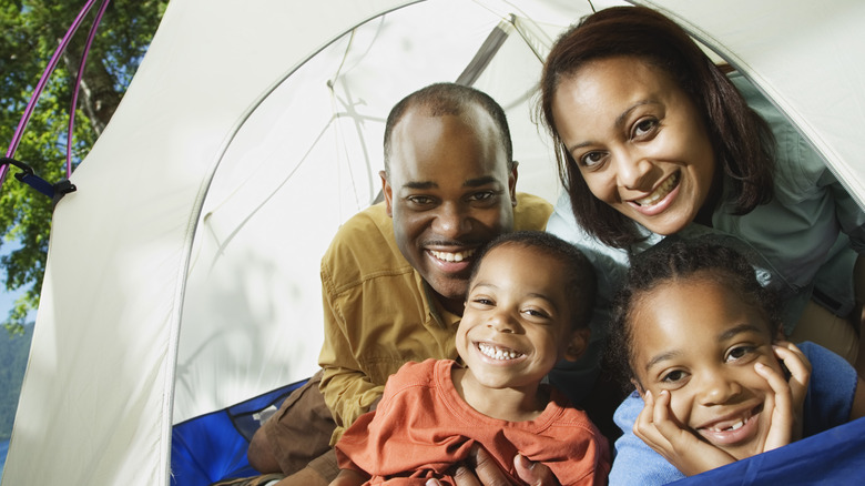 Family camping in a tent