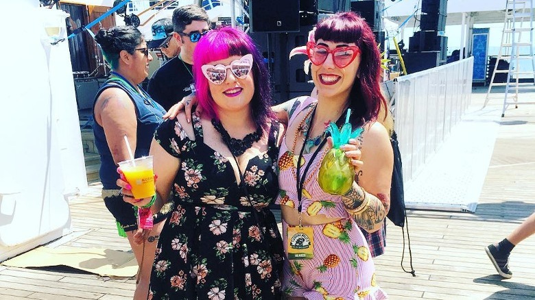 two women with drinks