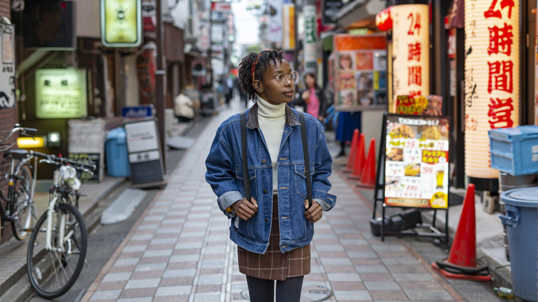 Woman with backpack in Japan