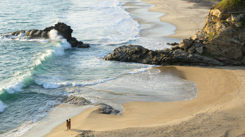 people on a remote beach