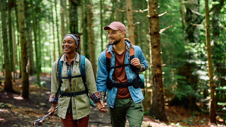 couple hiking in woods