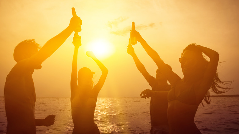 People dancing on the beach