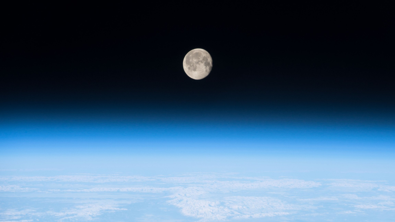 The Unique Atmosphere of the Moon Compared to Earth