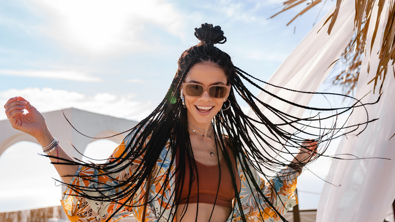 An Essential Precaution Tourists Often Miss Before Getting Hair Braids on a Beach Vacation