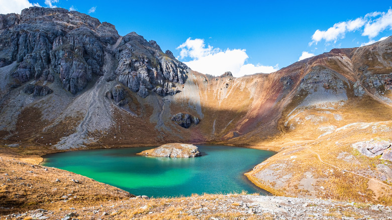The Otherworldly Vibrant Colors of This Hidden Gem: A Colorado Mountain Lake Trail
