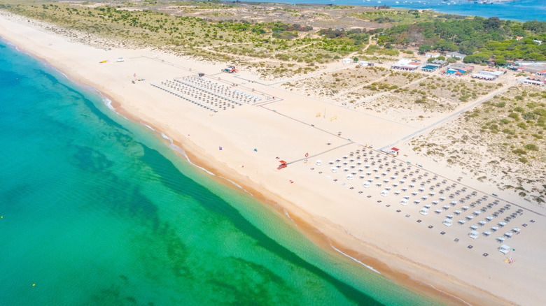 Discover One of Portugal's Most Beautiful Algarve Beaches with Cream-Colored Sand on a Tranquil Island Paradise