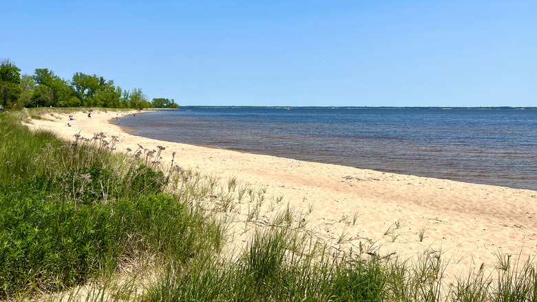 Explore This Charming Lake Michigan Harbor Town with Soft-Sand Beaches, Delicious Fried Fish, and Peaceful Lighthouse Walks
