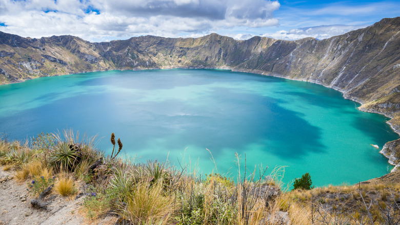 Ecuador's Hidden Crater Lake: A Vibrant Green Gem of the Andes Encircled by Scenic Trails and Rich Culture