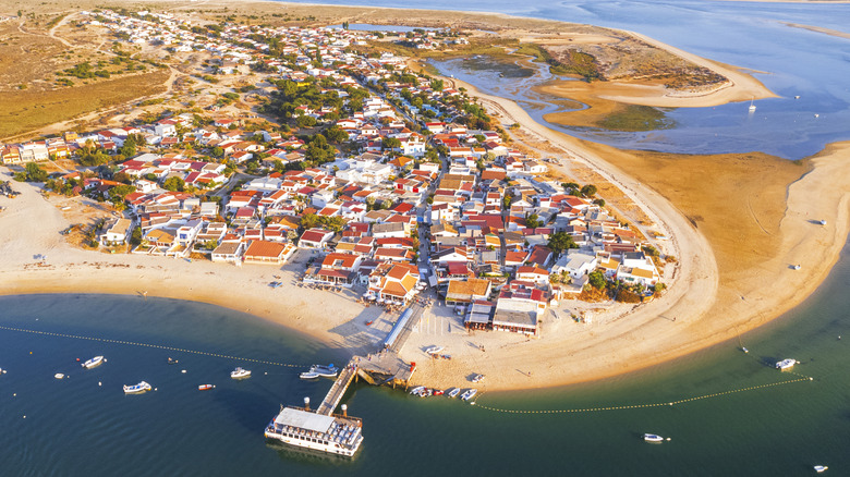 Discover Secluded Paradise: Portugal's Hidden Gem, Algarve Island, with Pristine White Sands and Beachfront Rentals