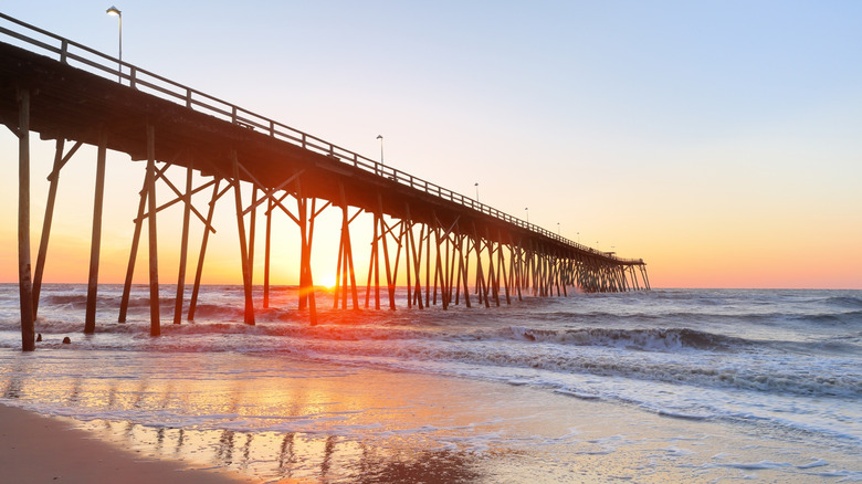 Explore the Laid-Back Charm of This North Carolina Island Beach Town with Colorful Homes, Markets, and a Scenic Boardwalk