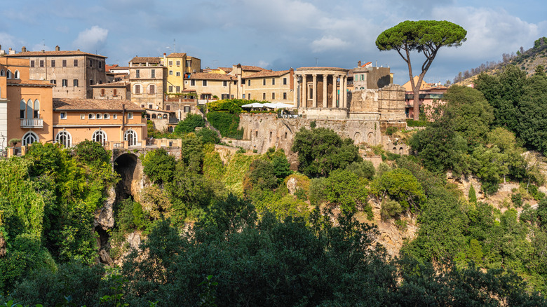 Explore Tivoli's Tranquil Villa: A Haven of Lush Trails, Waterfalls, and an Ancient Roman Temple