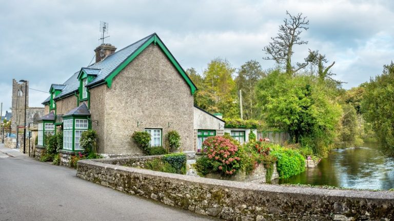 Horseback Riding by Serene Lakes in an Irish Village with Thatched Cottages