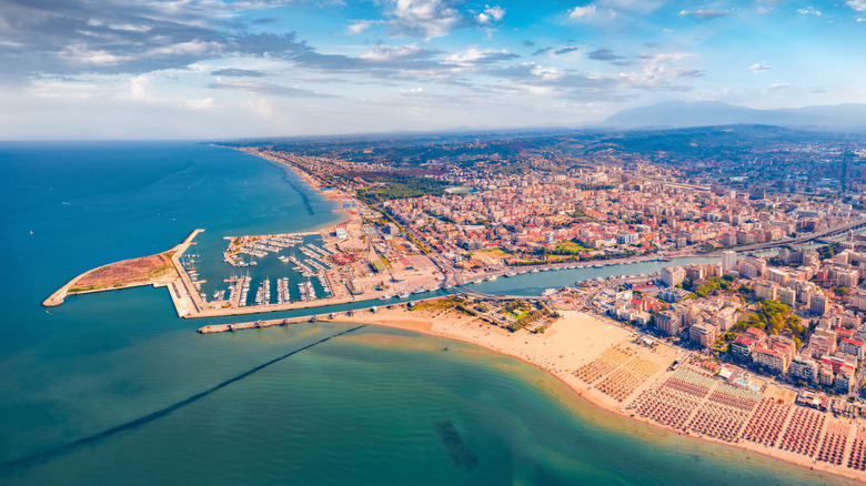 Nestled Between the Sea and Mountains: Italy's Hidden Gem with Serene Beaches and Shopping