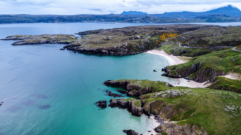The "Ultimate Road Trip" Explores Scotland's Scenic Coastline Through Charming Villages, Mountains, and Beaches