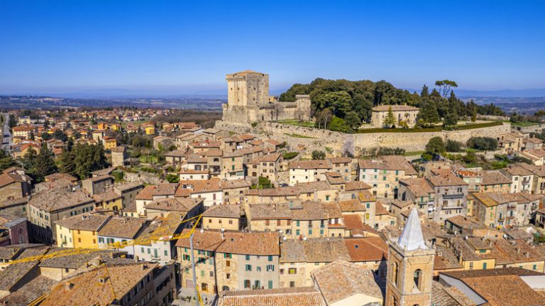 This Timeless Italian Hill Town Is Enveloped by Tuscan Vineyards, Hot Springs, and Stunning Countryside