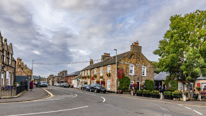 Just South of Edinburgh Lies Scotland's Tranquil Village with a Scenic Chapel, Castle Ruins, and Hidden Staircases