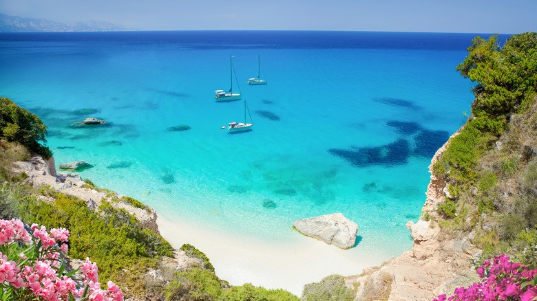 Discover a Secluded Coastal Retreat in Italy's Gulf of Orosei, Far from the Tourist Crowds, Featuring Stunning Mountains and Beaches