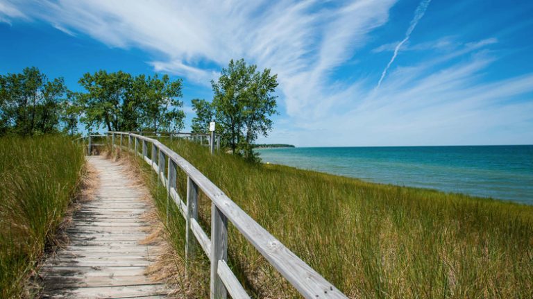 This Serene Michigan Village on Lake Huron's Shoreline is a Picturesque Water Sports Paradise