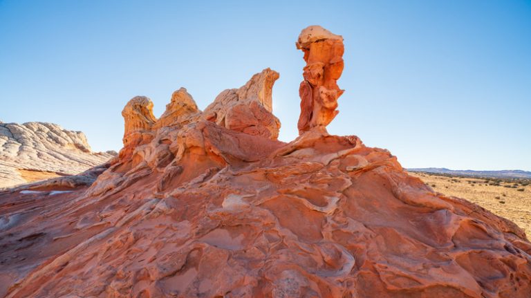Arizona's Canyon Monument: A Vibrant Wonderland of Towering Cliffs and Swirling Stone Waves
